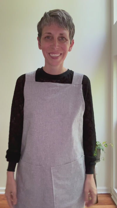 Kristen shows how to take the apron on and off 